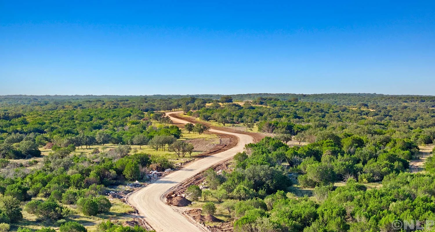 Winding paved road through Sawmill Ridge